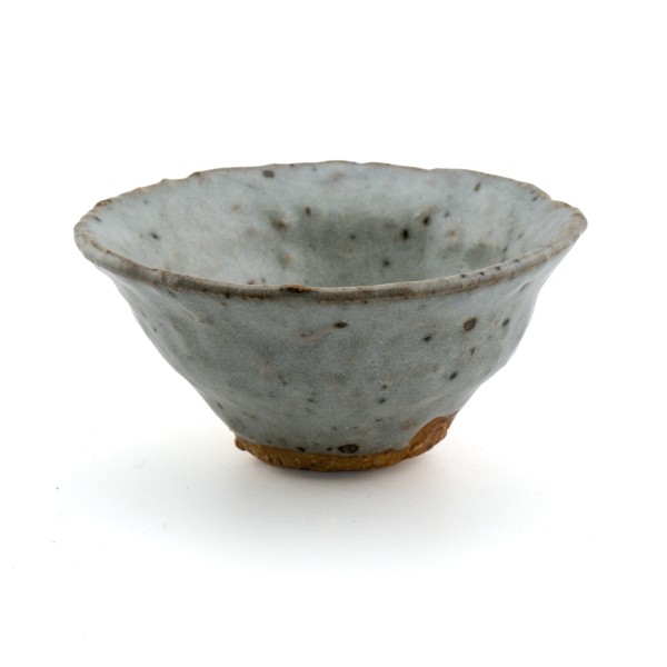 Wood-fired ceramic tea cup with thick light-gray glaze and fine iron speckles by Jiří Duchek