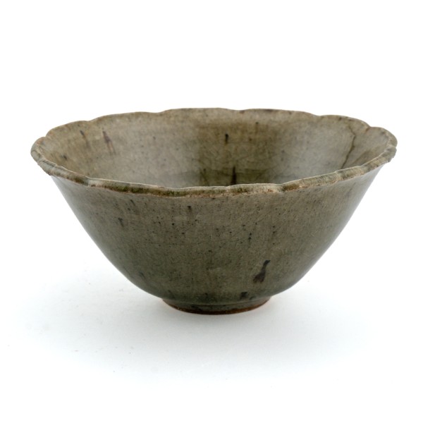 Wood-fired ceramic tea cup with greenish crackle glaze and fine iron speckles by Jiří Duchek